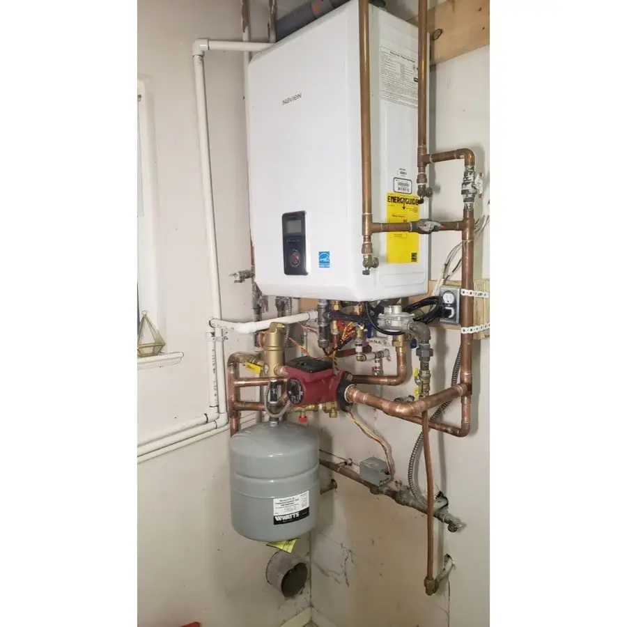 Repaired wall-mounted boiler with new piping