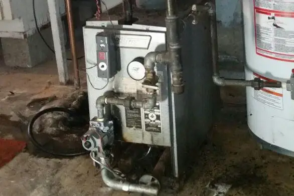Floor-standing boiler and piping during an annual service