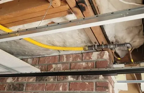 Black iron gas pipe and fittings installed by a gas fitter