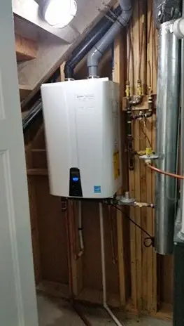 Tankless water heater with gas and water connections
