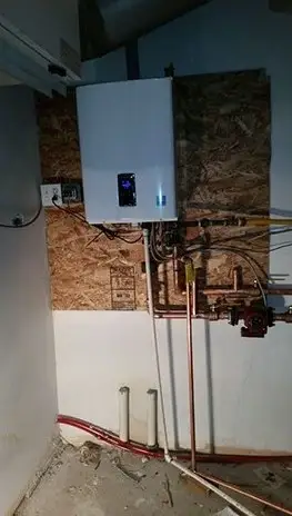 Wall-mounted tankless water heater installation